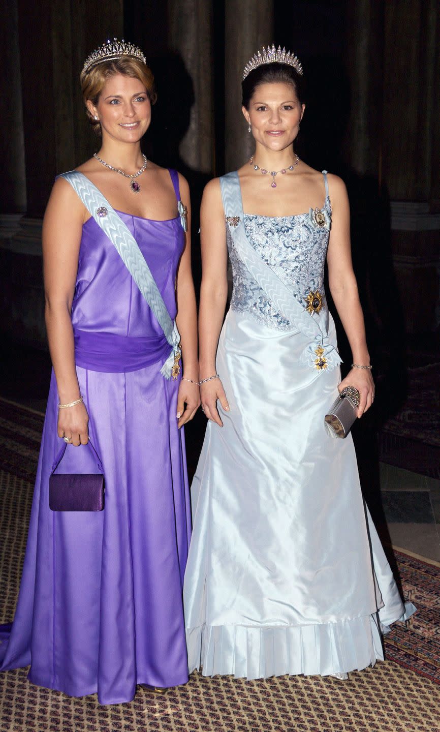 <p>Double the tiaras, double the sparkle. Crown Princess Victoria and Princess Madeleine dressed up for a gala dinner honoring Nobel Laureates held at the Royal Palace in Stockholm. </p>