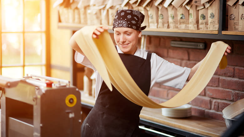 Fresh pasta being handled 