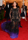 Beyonce was one of the very last celebs to arrive, but she was certainly worth the wait! The new mom strutted her stuff in an elaborate Givenchy creation, featuring intricate beading and black-and-purple feathers. What do you think her of her Vegas-like look?