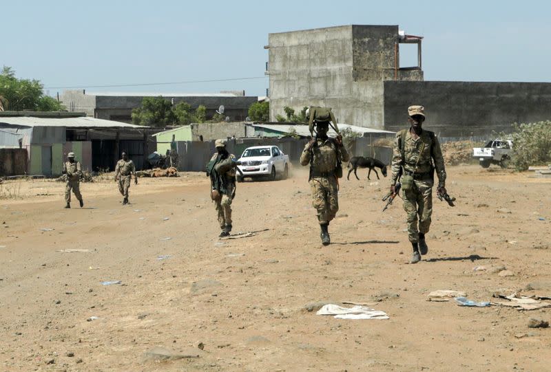 FILE PHOTO: Members of the Amhara Special Force return to the Dansha Mechanized 5th division Military base after fighting against the Tigray People's Liberation Front (TPLF), in Danasha, Amhara region near a border with Tigray