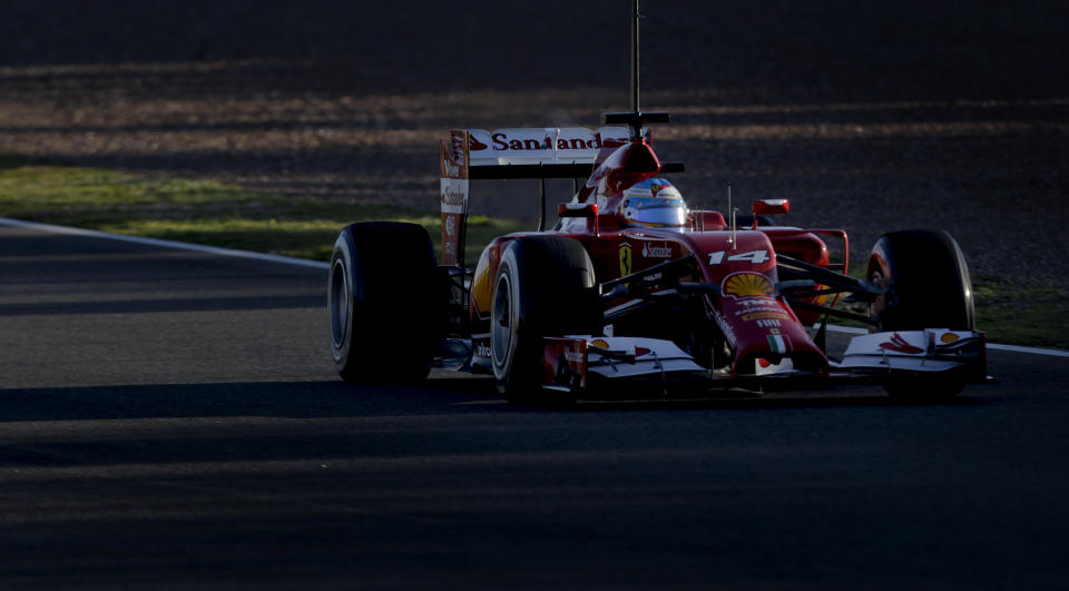 Fernando Alonso of Spain and Ferrari drives the new F14T car during the 2014 Formula One Testing at the Circuito de Jerez on Thursday, Jan. 30, 2014, in Jerez de la Frontera, Spain. (AP Photo/Miguel Angel Morenatti)