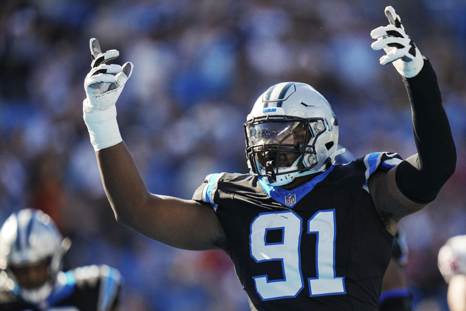 Carolina Panthers defensive end Nick Thurman (91) celebrates a defensive stop against the Houston Texans during the second half of an NFL football game, Sunday, Oct. 29, 2023, in Charlotte, N.C. (AP Photo/Rusty Jones)