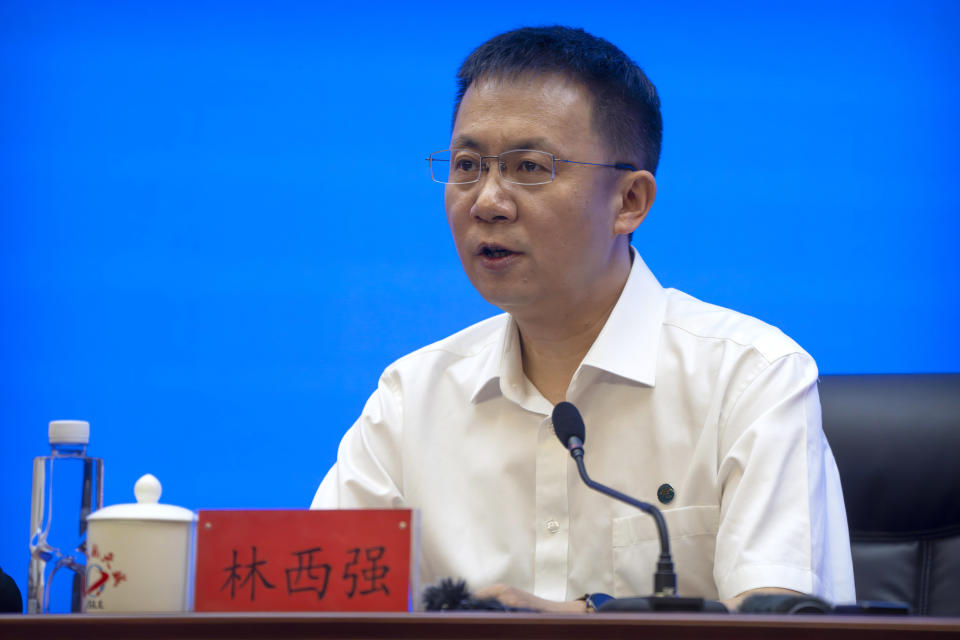 Lin Xiqiang, Deputy Director of the Chinese Manned Space Agency speaks during a press conference at the Jiuquan Satellite Launch Center in northwest China on Monday, May 29, 2023. China's space program plans to land astronauts on the moon before 2030, a top official with the country's space program said Monday. (AP Photo/Mark Schiefelbein)