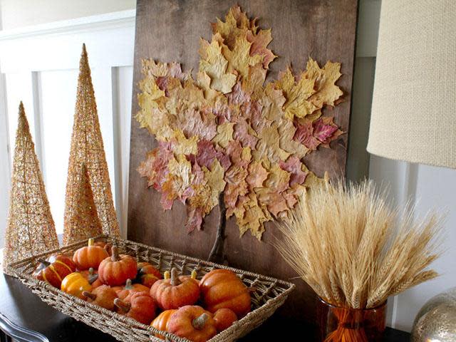 mini pumpkins in a wicker basket on a mantel