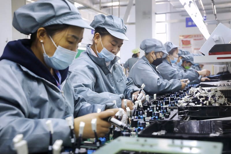 <cite>中國藍領工人的工資仍在上升。（資料照，美聯社）</cite>
