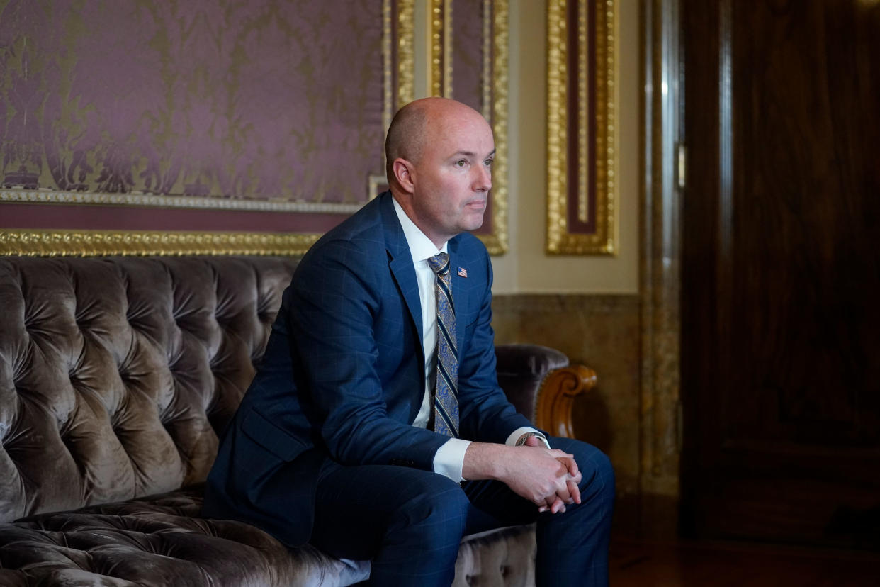 Utah Gov. Spencer Cox looks on during an interview at the Utah State Capitol