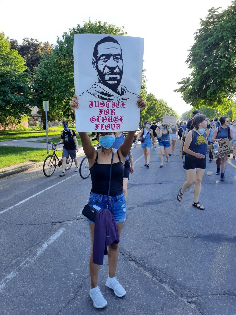 Andres Guzman's Instagram graphic became a poster at a Minneapolis protest.