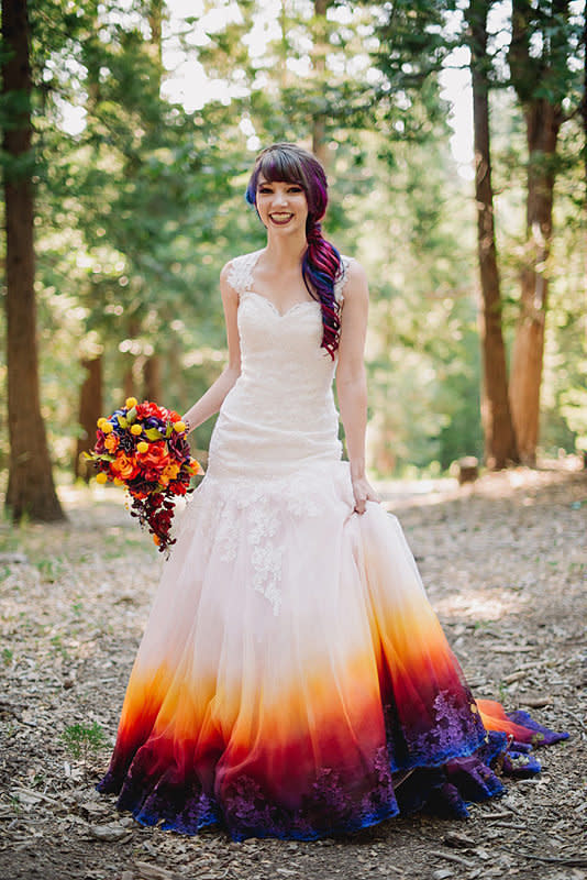 "I got this dress at a discount store way in advance. I wouldn't have ever guessed I would ended up picking out a dress like this,&nbsp;SO bridal.&nbsp;I had never desired a traditional style but when I put it on, I felt like a bride, and once I added the color [with my airbrush], I felt like myself," creative bride <a href="https://www.taylorannart.com/blog/colorfulsunsetweddingdress" target="_blank">Taylor Ann Linko wrote on her art blog</a>. "At first, I was 99 percent sure I could do this. Twenty minutes into coloring, I thought I ruined my dress. It took a few days for me to regain confidence and work on it again." She added, "In the end, the shock and awe of my dress helped me feel calm and confident. My colorful personality was shining through and everyone there loved it. I wasn't trying to make some big statement -- it's as simple as wanting to wear something I felt beautiful in."