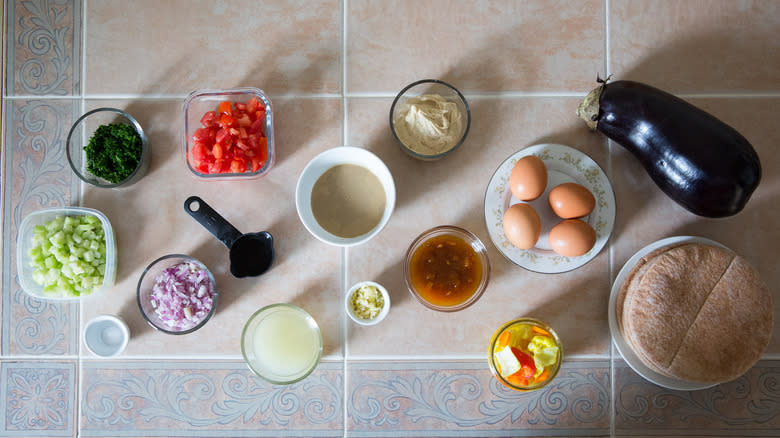 sabich sandwich ingredients on table