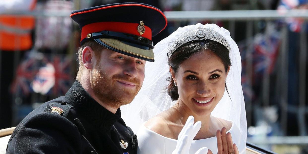 prince harry and meghan markle wave to crowds on their wedding day