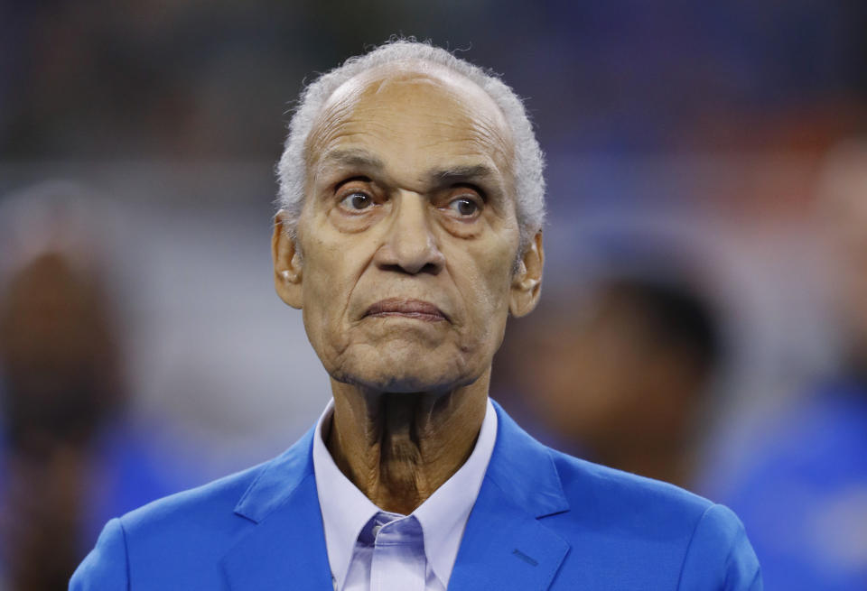 FILE - In this Oct. 28, 2018, file photo, Former Detroit Lions player Roger Brown watches during the team's NFL football game against the Seattle Seahawks in Detroit. Brown, a College Football Hall of Famer and six-time Pro Bowl selection with the Lions and the Los Angeles Rams, has died. He was 84. The Lions and College Football Hall of Fame announced his death Friday, Sept. 17, 2021. The Lions said a member of Brown's family confirmed the death. No cause was given. (AP Photo/Paul Sancya, File)