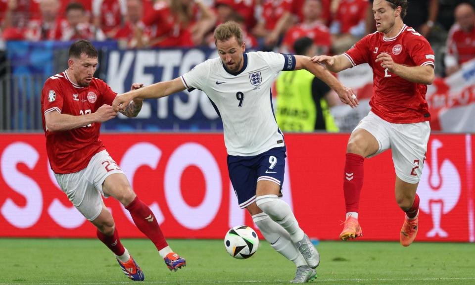 <span>England would get the most out of Harry Kane by cutting out the massed No 10s and going back to a 4-3-3 formation.</span><span>Photograph: Adrian Dennis/AFP/Getty Images</span>