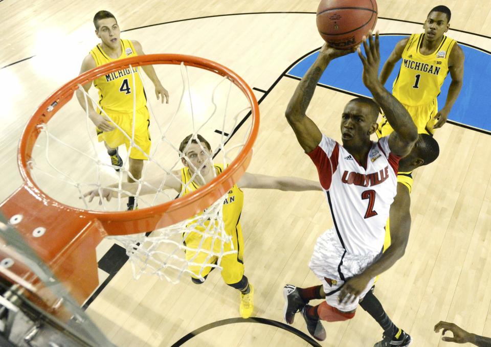 Louisville Smith scores against Michigan in the first half of their NCAA men's Final Four championship basketball game in Atlanta