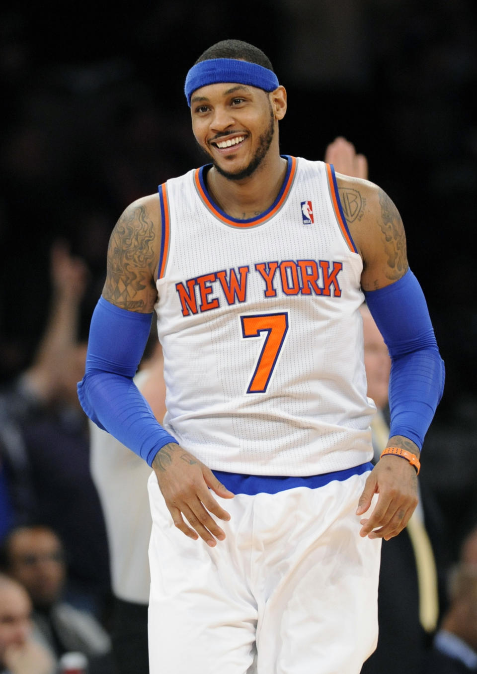 New York Knicks' Carmelo Anthony smiles after hitting a 3-point shot during the third quarter of an NBA basketball game against the Charlotte Bobcats, Friday, Jan. 24, 2014 at Madison Square Garden in New York. Anthony scored 62 points as the Knicks won 125-96. (AP Photo/Bill Kostroun)