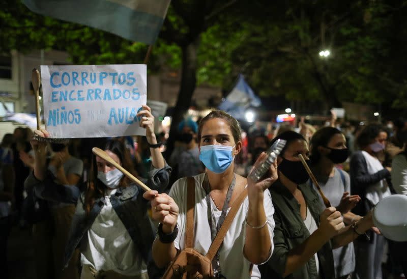 Demonstrators protest against new restrictions amid a rise in coronavirus disease (COVID-19) cases in Buenos Aires