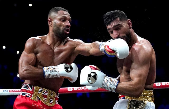 Kell Brook, left, in action against Amir Khan