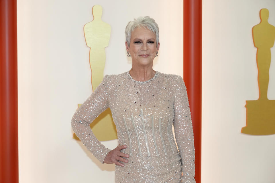 Jamie Lee Curtis shimmers at 2023 Oscars with husband Christopher Guest