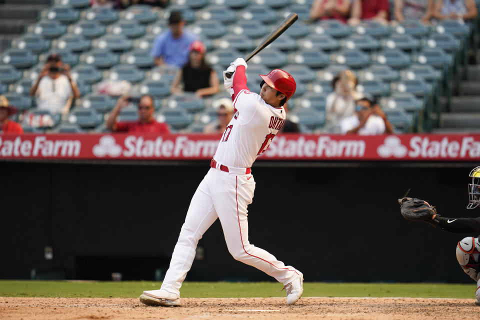 Los Angeles Angels designated hitter Shohei Ohtani (17) hits a home run during the seventh inning of a baseball game against the Detroit Tigers in Anaheim, Calif., Wednesday, Sept. 7, 2022. (AP Photo/Ashley Landis)