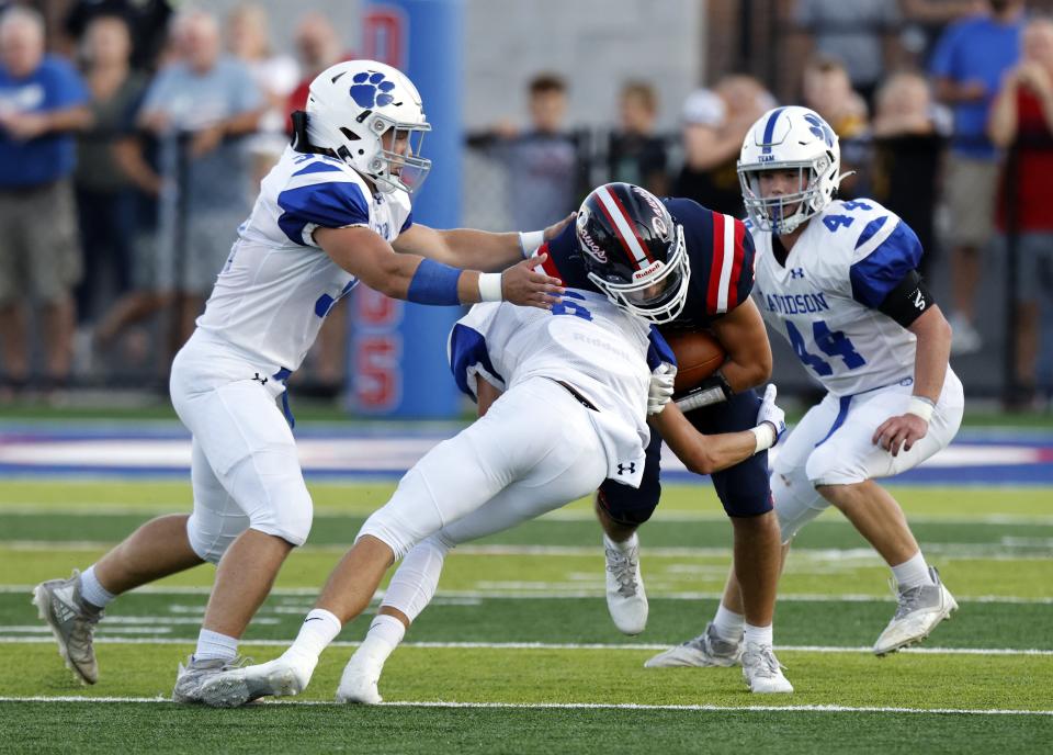 Caden Wilson (left) was Hilliard Davidson's leading tackler last season.