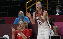 United States' Sue Bird (6) cheers for her teammates from the bench during women's basketball semifinal game between the United States and Serbia at the 2020 Summer Olympics, Friday, Aug. 6, 2021, in Saitama, Japan. (AP Photo/Eric Gay)