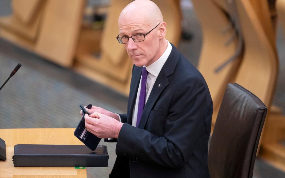 John Swinney, the Deputy First Minister - PA