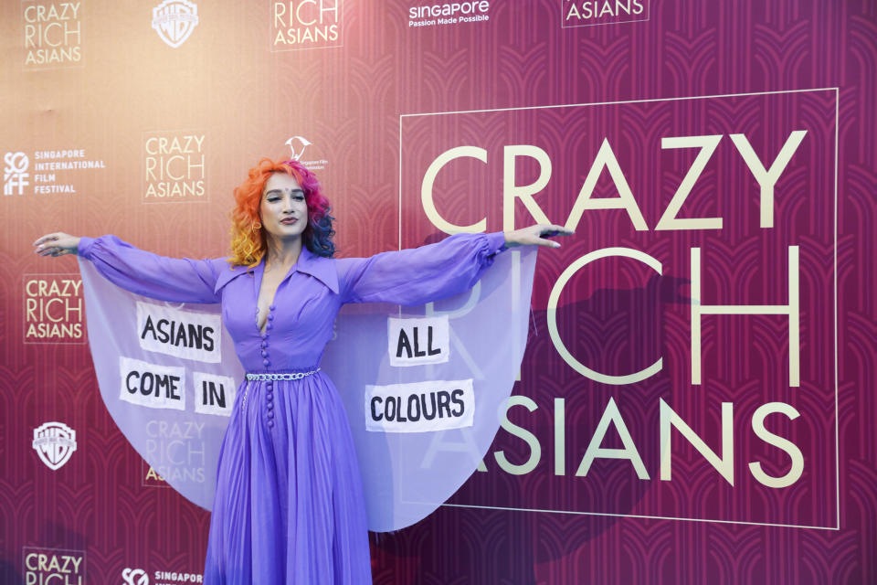 <p>Burlesque dancer Sukki Singapora poses for photographers at the Singapore premiere of ‘Crazy Rich Asians’ on 21 August 2018. (PHOTO: Yahoo Lifestyle Singapore) </p>