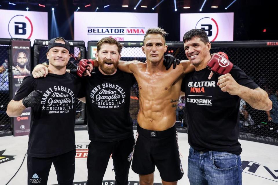 “The Italian Gangster” Danny Sabatello (14-2) with his friend Aaron Assad and American Top Team coaches including Mike Brown, after beating Marcus Breno at Bellator MMA 294 in April in Hawaii.