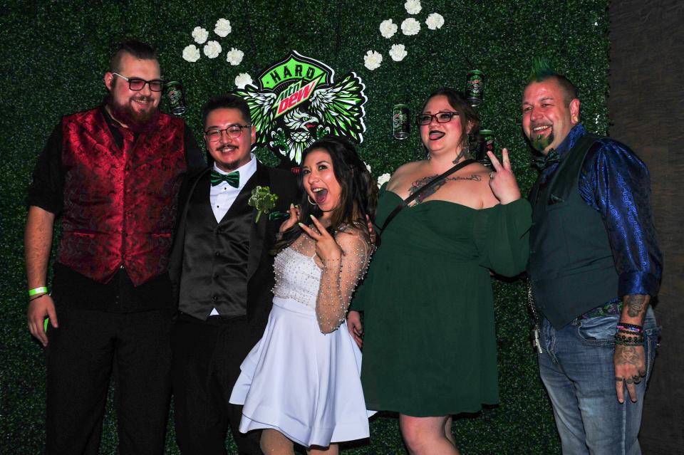 From left, Daniel Dox, Nicolas Enriquez, Alina Ibarra, Meghan Miller and Josh Thompson pose for a picture at The Foundry for the Hard Mountain Dew wedding.