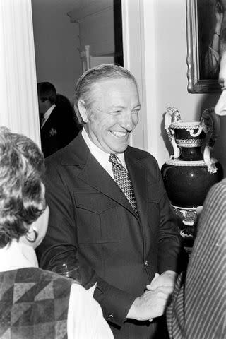 <p>Bruce Paulson/WWD/Penske Media via Getty </p> Boris Sagal attends a party, celebrating the in-production TV miniseries "The Awakening Land," at the governor's mansion in Springfield, Illinois, on October 16, 1977.