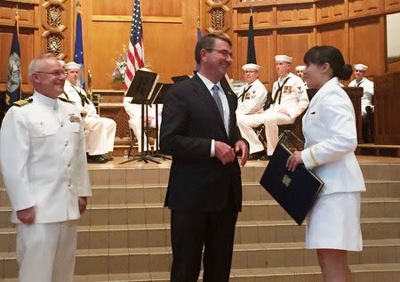 US Defense Secretary Ash Carter (C) speaks with Gabrielle Fong, shortly after her commissioning as a naval officer at Yale University, New Haven, Connecticut, US May 23, 2016. REUTERS/Yeganeh Torbati