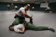 <p>New U.S. Border Patrol agents practice take-down procedures at the Border Patrol Academy on August 2, 2017 in Artesia, N.M. (Photo: John Moore/Getty Images) </p>