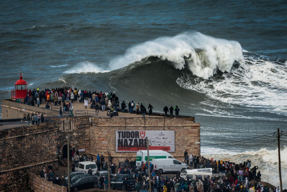 Hundreds of spectators are gathering at the Nazare lighthouse in Nazare, Portugal, on November 5, 2023, to take advantage of the forecasted giant waves. 