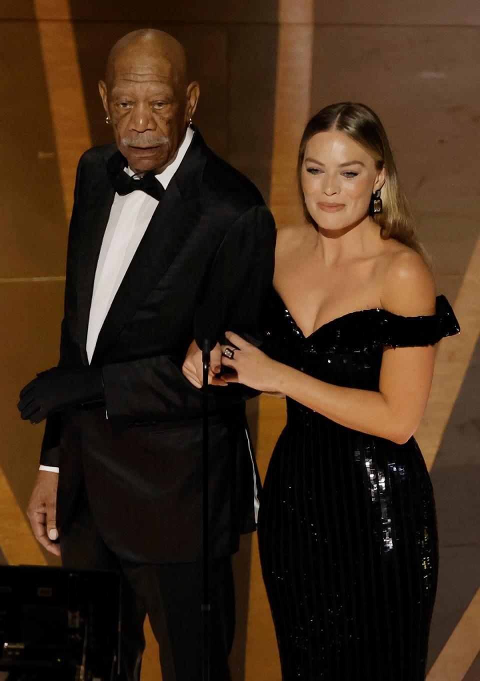 Morgan Freeman and Margot Robbie speak onstage during the 95th Annual Academy Awards (Kevin Winter/Getty Images)