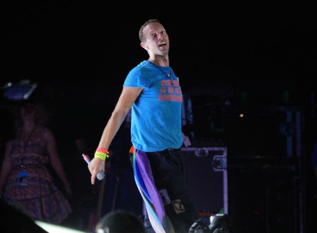 Chris Martin of Coldplay performing on the Pyramid Stage