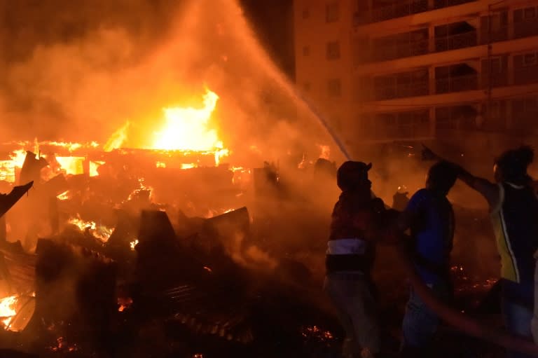 Clashes erupted in Nairobi's Kawangware slum where opposition supporters set light to shops owned by members of Kikuyu tribe of President Uhuru Kenyatta