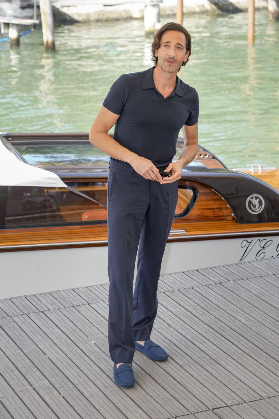 Adrien Brody poses for photographers upon arrival for the photo call of the film 'Blonde' during the 79th edition of the Venice Film Festival in Venice, Italy, Thursday, Sept. 8, 2022. (AP Photo/Domenico Stinellis)