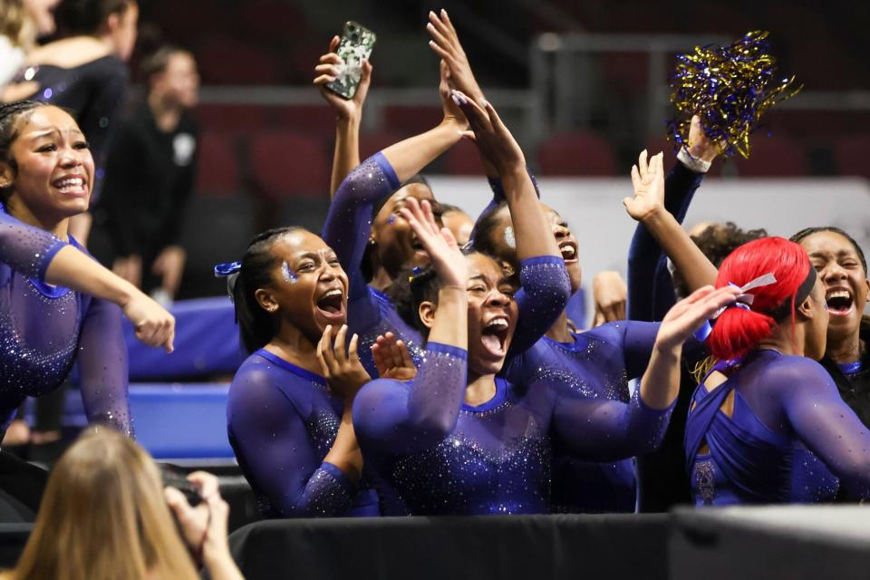 Mandatory Credit: Photo by Chase Stevens/AP/Shutterstock (13701082k) Members of the Fisk University team cheer during a Super 16 gymnastics meet, in Las Vegas. The Fisk women's gymnastics team became the first historically Black college or university to compete at the NCAA level Fisk Arrives Gymnastics, Las Vegas, United States - 06 Jan 2023