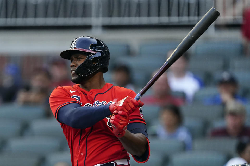 Atlanta Braves' Jorge Soler connects on a single in the first inning of a baseball game against the Washington Nationals, Friday, Aug. 6, 2021, in Atlanta. (AP Photo/John Bazemore)