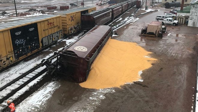 Six box cars carrying grain derailed under the 10th Street Bridge in downtown Sioux Falls in March 2018, an accident caused when the rail lines were found to be too far apart, according to federal reports.