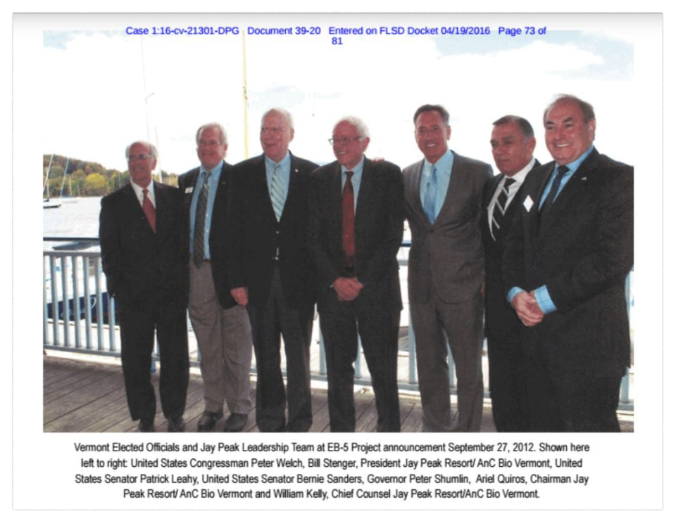 Ariel Quiros, second from right, Bill Kelly, right, and Bill Stenger, second from left, pose with Vermont's governor and congressional delegation, including Sen. Patrick Leahy and Sen. Bernie Sanders, at a news conference Sept. 27, 2012. This photo was released in documents from the state of Vermont.