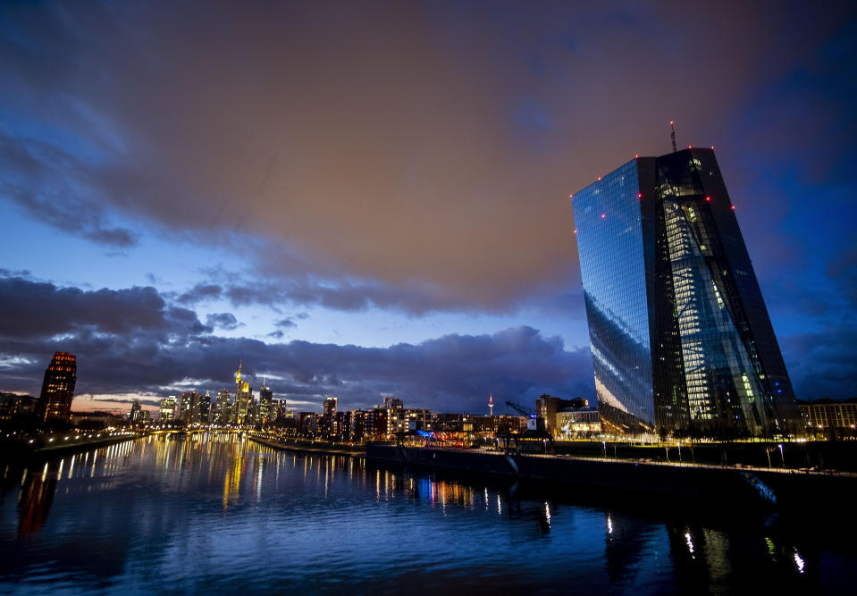 Clouds drift over the European Central Bank, right, in Frankfurt, Germany, Saturday, Jan. 18, 2020. (AP Photo/Michael Probst)