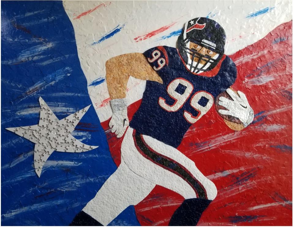 Eco-artist Grant Manier created a collage of JJ Watt out of more than 15,000 recycled puzzle pieces.