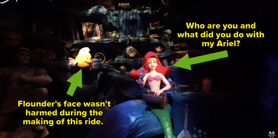 a screengrab of the inside of the Little Mermaid ride at Magic Kingdom