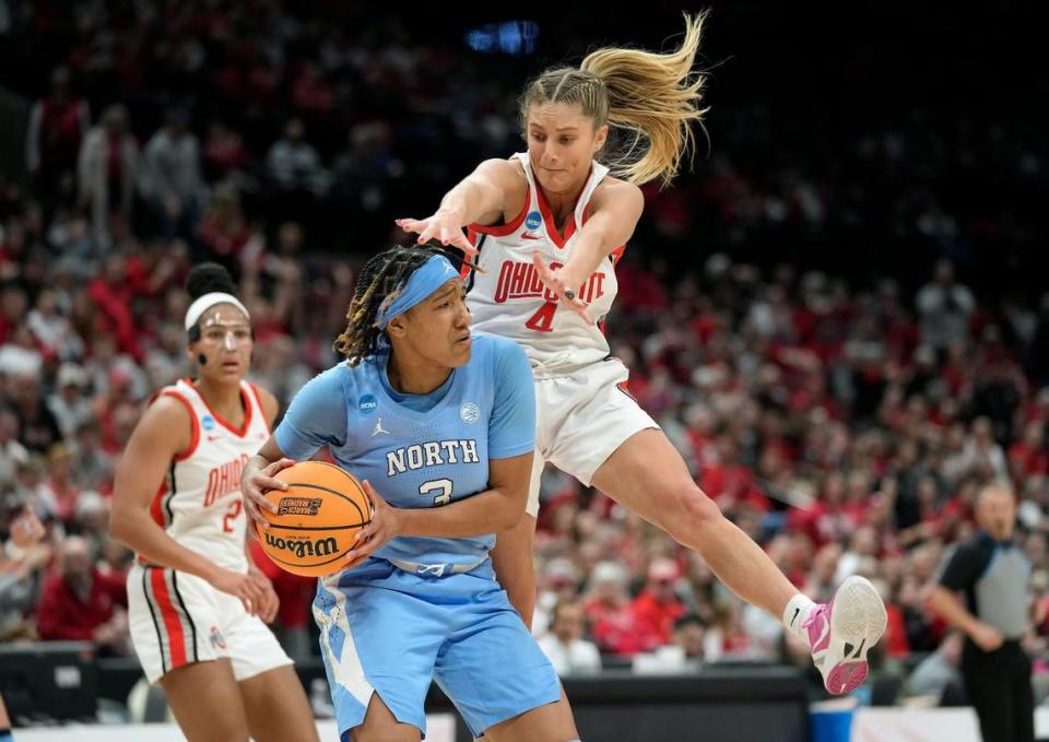 Ohio State Buckeyes guard Jacy Sheldon (4) tries to steal the ball from North Carolina Tar Heels guard Kennedy Todd-Williams (3) during the first quarter of their NCAA second round game at at Value City Arena.