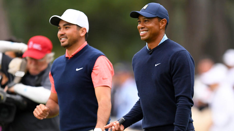 Pictured here, Jason Day and Tiger Woods share a laugh together on the golf course.