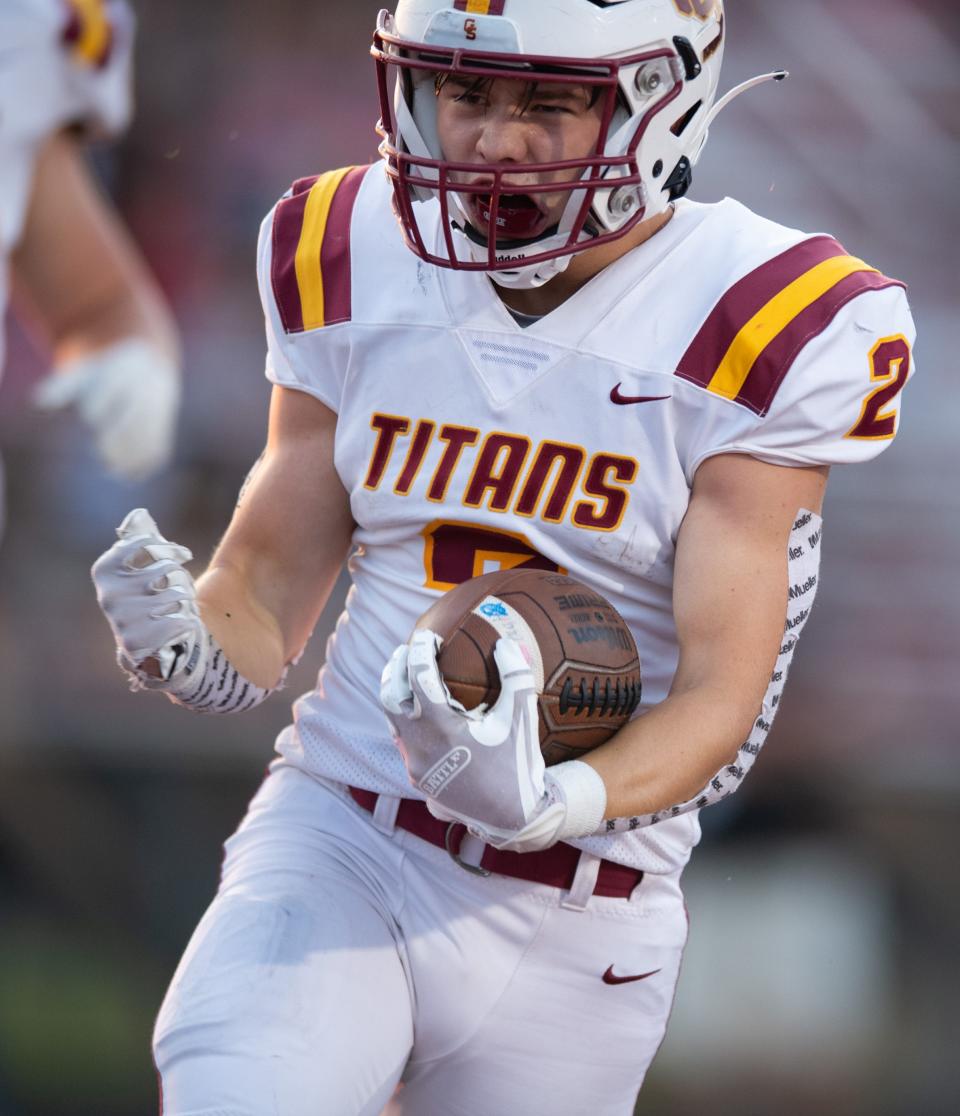 Gibson Southern’s Sean DeLong (2) runs the ball in for a touchdown as the Gibson Southern Titans play the Southridge Raiders at Southridge High School in Huntingburg, Ind., Friday evening, Sept. 16, 2022. 