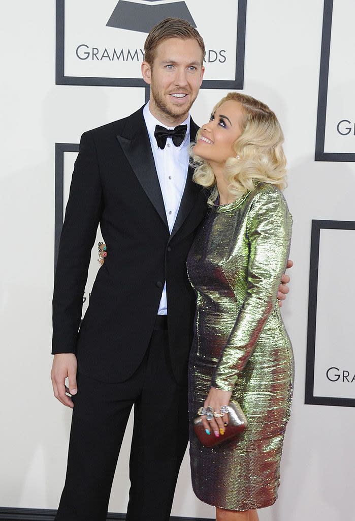 rita looking up at calvin on the red carpet