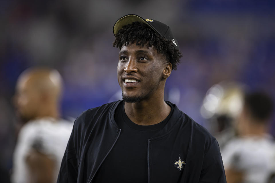 BALTIMORE, MD - AUGUST 14: Michael Thomas #13 of the New Orleans Saints looks on from the sidelines during the second half of a preseason game against the Baltimore Ravens at M&T Bank Stadium on August 14, 2021 in Baltimore, Maryland. (Photo by Scott Taetsch/Getty Images)