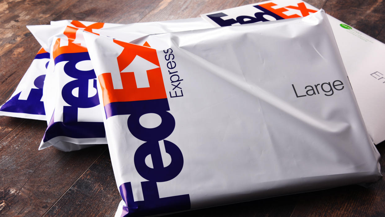 POZNAN, POL - AUG 2, 2017: Envelopes and parcels of FedEx, an American multinational courier delivery services company headquartered in Memphis, Tennessee.