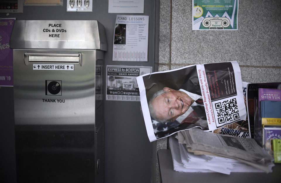 A poster of former attorney general Jeff Sessions is torn down inside Robert Frost Library on the campus of Amherst College in Amherst, Mass., Wednesday, April 24, 2019. Sessions had a speaking engagement at the college. (AP Photo/Jessica Hill)